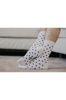 Chaussettes blanc pois noir
