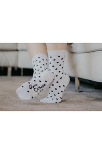 Chaussettes blanc pois noir